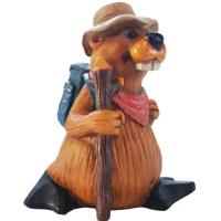 An enthusiastic, smiling hiking beaver takes hiking seriously. A full colour tabletop ceramic figurine.